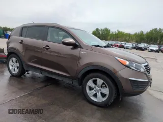 2013 Kia Sportage LX z VIN KNDPBCA29D7458904, wystawiony jako Copart lot #59175745 z przebiegiem 100 719 mil mil oraz Szkoda całkowita • Salvage title. Historia ofert i sprzedaży dostępna na DreamBid. Obrazek 4.
