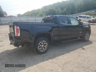 2018 GMC Canyon 4WD All Terrain w/Cloth with VIN 1GTG6CEN0J1301365, listed as a Copart auction lot 69886294 with 61,857 mi miles and Salvage Title. Bid and sale history available at carsss.com. Image 3.