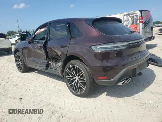 2024 Porsche Macan with VIN WP1AA2A53RLB14849, listed as a Copart auction lot 57979155 with 10,031 mi miles and Salvage title. Bid and sale history available at DreamBid. Image 2.