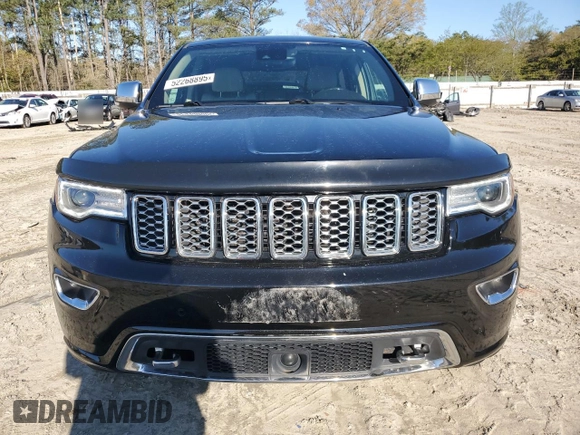 2017 Jeep Grand Cherokee Overland with VIN 1C4RJFCT3HC755960, listed as a Copart auction lot 52268895 with 99,998 mi miles and Salvage title. Bid and sale history available at DreamBid. Image 5.