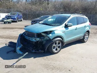 2013 Ford Escape SE with VIN 1FMCU9GX3DUB67956, listed as a IAAI auction lot 41901607 with 102,499 mi miles. Bid and sale history available at carsss.com. Image 2.