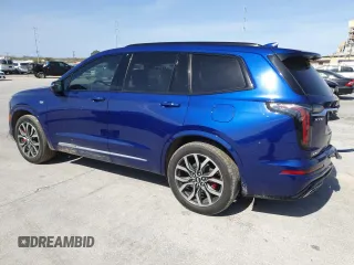 2023 Cadillac XT6 AWD Sport with VIN 1GYKPHRSXPZ117852, listed as a Copart auction lot 47895715 with 61,169 mi miles and Salvage title. Bid and sale history available at DreamBid. Image 2.