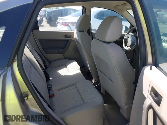 2008 Ford Focus SE with VIN 1FAHP35N68W154490, listed as a IAAI auction lot 42128643 with 141,316 mi miles. Bid and sale history available at carsss.com. Image 8.