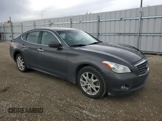 2011 Infiniti M37 with VIN JN1BY1AR2BM371065, listed as a Copart auction lot 74764014 with 175,130 mi miles and Salvage Title. Bid and sale history available at carsss.com. Image 4.