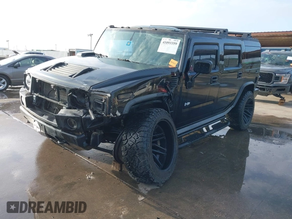 2003 Hummer H2 z VIN 5GRGN23UX3H112173, wystawiony jako IAAI lot #41093359 z przebiegiem Nie podano mil oraz . Historia ofert i sprzedaży dostępna na DreamBid. Obrazek 20.