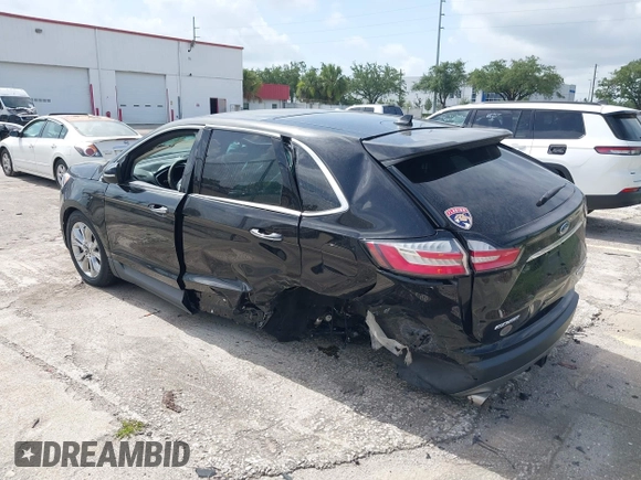 2020 Ford Edge Titanium with VIN 2FMPK4K93LBA05221, listed as a IAAI auction lot 42497787 with Not provided miles and . Bid and sale history available at DreamBid. Image 3.