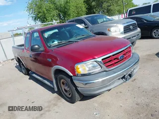 2002 Ford F-150 XL z VIN 2FTRX17232CA71155, wystawiony jako IAAI lot #42443366 z przebiegiem 207 376 mil mil oraz . Historia ofert i sprzedaży dostępna na DreamBid. Obrazek 1.