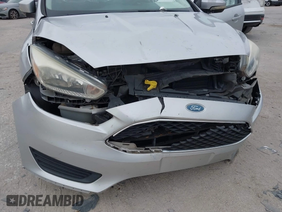 2015 Ford Focus SE with VIN 1FADP3K25FL328797, listed as a IAAI auction lot 41328404 with 72,368 mi miles. Bid and sale history available at carsss.com. Image 6.
