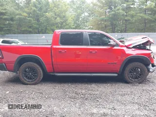2021 Ram 1500 Rebel with VIN 1C6SRFLT2MN591844, listed as a IAAI auction lot 40410248 with 84,759 mi miles and . Bid and sale history available at DreamBid. Image 13.