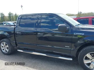 2015 Ford F-150 XLT z VIN 1FTEW1E86FFA73551, wystawiony jako IAAI lot #42191116 z przebiegiem 97 374 mil mil oraz . Historia ofert i sprzedaży dostępna na DreamBid. Obrazek 13.