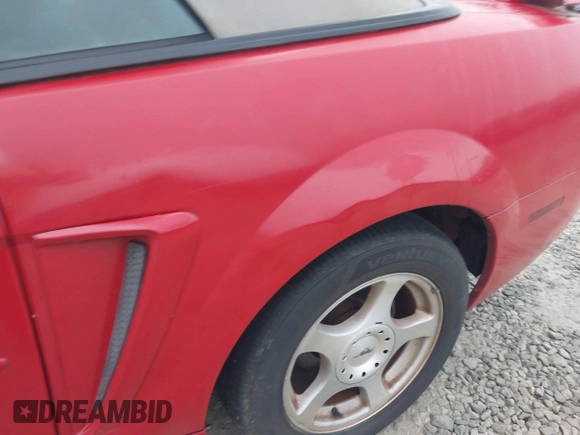 2004 Ford Mustang Deluxe with VIN 1FAFP44694F196850, listed as a IAAI auction lot 41917890 with 146,585 mi miles. Bid and sale history available at carsss.com. Image 6.
