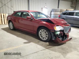 2014 Chrysler 300 z VIN 2C3CCARG9EH308723, wystawiony jako Copart lot #52051595 z przebiegiem 39 478 mil mil oraz Szkoda całkowita • Salvage title. Historia ofert i sprzedaży dostępna na DreamBid. Obrazek 4.
