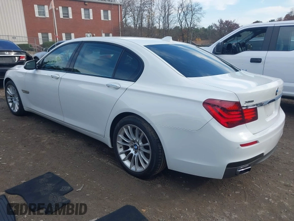 2015 BMW 7 Series 750Li xDrive with VIN WBAYF8C56FD654765, listed as a IAAI auction lot 40734550 with 133,848 mi miles and . Bid and sale history available at carsss.com. Image 3.