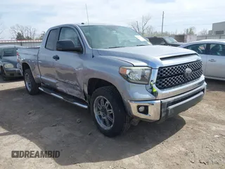 2018 Toyota Tundra 2WD SR with VIN 5TFRM5F16JX133735, listed as a IAAI auction lot 41818455 with 148,456 mi miles. Bid and sale history available at carsss.com. Image 1.