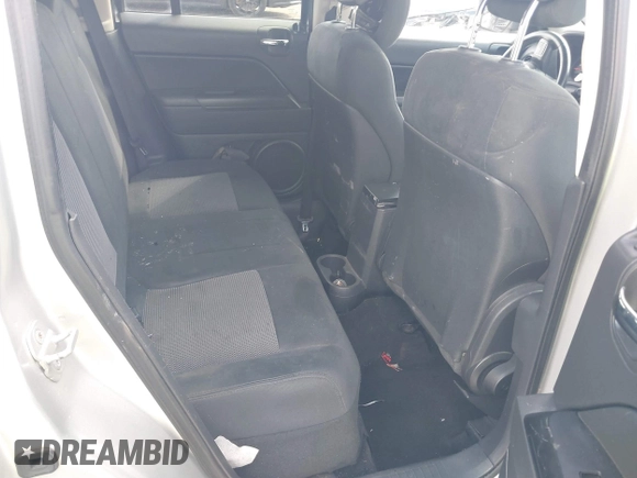 2013 Jeep Patriot Latitude with VIN 1C4NJPFA1DD260398, listed as a IAAI auction lot 41726749 with 146,609 mi miles. Bid and sale history available at carsss.com. Image 8.