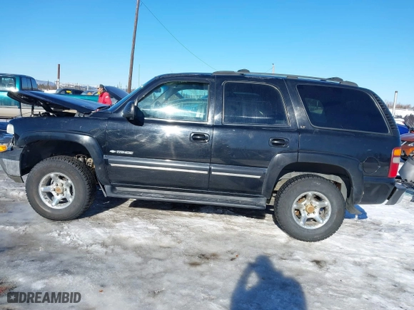 2001 Chevrolet Tahoe LS with VIN 1GNEK13T01J116989, listed as a IAAI auction lot 41871390 with 265,541 mi miles. Bid and sale history available at carsss.com. Image 14.