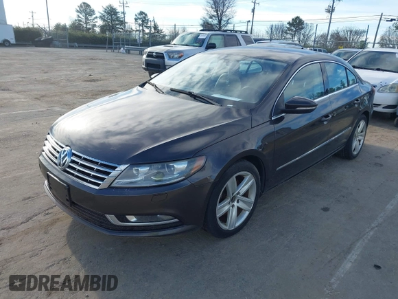 2013 Volkswagen CC Sport with VIN WVWBN7AN4DE516691, listed as a IAAI auction lot 41606473 with 109,711 mi miles and . Bid and sale history available at DreamBid. Image 2.