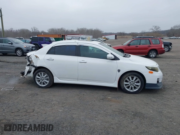 2011 Toyota Corolla L with VIN 2T1BU4EE8BC681039, listed as a IAAI auction lot 41798321 with 195,583 mi miles. Bid and sale history available at carsss.com. Image 13.