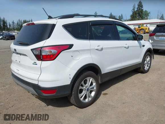 2018 Ford Escape SE with VIN 1FMCU9GD8JUB14879, listed as a IAAI auction lot 42156044 with 91,304 mi miles. Bid and sale history available at carsss.com. Image 4.