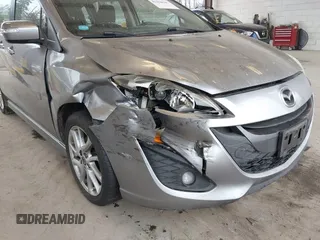 2014 Mazda 5 Touring with VIN JM1CW2CL6E0164146, listed as a IAAI auction lot 41458945 with 157,345 mi miles. Bid and sale history available at carsss.com. Image 6.