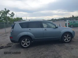2007 Mitsubishi Outlander XLS z VIN JA4MS41X57Z016273, wystawiony jako IAAI lot #38897236 z przebiegiem 165 376 mil mil oraz . Historia ofert i sprzedaży dostępna na DreamBid. Obrazek 13.