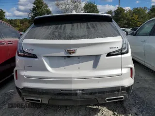 2024 Cadillac XT4 AWD Sport with VIN 1GYFZFR44RF195386, listed as a Copart auction lot 74949924 with 2,693 mi miles and Salvage title. Bid and sale history available at DreamBid. Image 6.