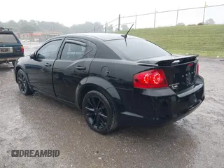 2013 Dodge Avenger SXT with VIN 1C3CDZCB5DN716005, listed as a IAAI auction lot 42644469 with 205,527 mi miles and . Bid and sale history available at DreamBid. Image 3.