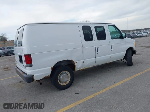 2004 Ford Econoline Cargo with VIN 1FTNE24W84HB38152, listed as a IAAI auction lot 42090193 with 102,357 mi miles. Bid and sale history available at carsss.com. Image 4.