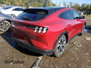 2021 Ford Mustang Mach-E Premium z VIN 3FMTK3SU0MMA57645, wystawiony jako Copart lot #63300732 z przebiegiem 14 776 mil mil oraz . Historia ofert i sprzedaży dostępna na DreamBid. Obrazek 4.