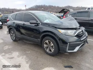 2020 Honda CR-V LX with VIN 2HKRW2H2XLH671349, listed as a IAAI auction lot 41204020 with 71,374 mi miles. Bid and sale history available at carsss.com. Image 1.