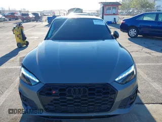 2023 Audi S5 Premium Plus with VIN WAUP4AF58PA001748, listed as a IAAI auction lot 41194878 with 33,877 mi miles and . Bid and sale history available at DreamBid. Image 12.