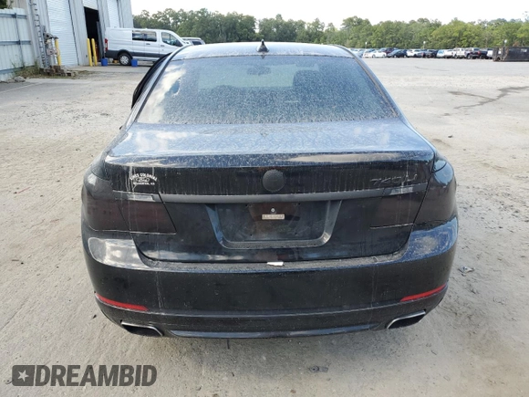 2015 BMW 7 Series 740Li with VIN WBAYE4C58FD138919, listed as a Copart auction lot 69409074 with 145,549 mi miles and Salvage Title. Bid and sale history available at DreamBid. Image 6.