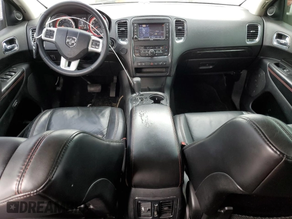 2013 Dodge Durango R/T with VIN 1C4SDHCT0DC648668, listed as a Copart auction lot 83211194 with 149,649 mi miles and Salvage title. Bid and sale history available at DreamBid. Image 8.