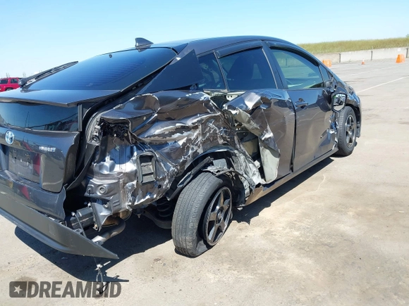 2016 Toyota Prius Two z VIN JTDKBRFU1G3521884, wystawiony jako IAAI lot #42081852 z przebiegiem 93 107 mil mil oraz . Historia ofert i sprzedaży dostępna na DreamBid. Obrazek 6.