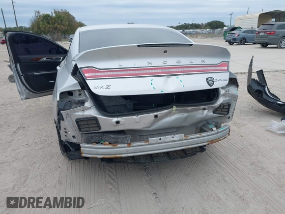 2014 Lincoln MKZ with VIN 3LN6L2G99ER808853, listed as a IAAI auction lot 41337248 with 155,676 mi miles. Bid and sale history available at carsss.com. Image 6.