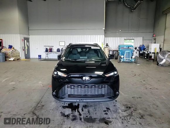 2025 Toyota Corolla Cross Hybrid S with VIN 7MUFBABG9SV065228, listed as a Copart auction lot 58408535 with 14,965 mi miles and Salvage title. Bid and sale history available at DreamBid. Image 14.
