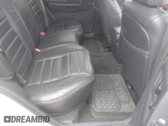 1998 Jeep Grand Cherokee Laredo with VIN 1J4GZ48S3WC204990, listed as a IAAI auction lot 41704176 with 185,376 mi miles. Bid and sale history available at carsss.com. Image 8.