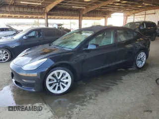 2022 Tesla Model 3 with VIN 5YJ3E1EA2NF190124, listed as a Copart auction lot 48759565 with 137,726 mi miles and Clean Title. Bid and sale history available at carsss.com. Image 1.
