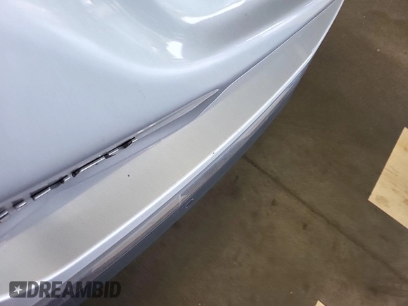 2020 Chevrolet Equinox LT with VIN 2GNAXJEV0L6236404, listed as a IAAI auction lot 42619695 with 77,124 mi miles and . Bid and sale history available at DreamBid. Image 18.