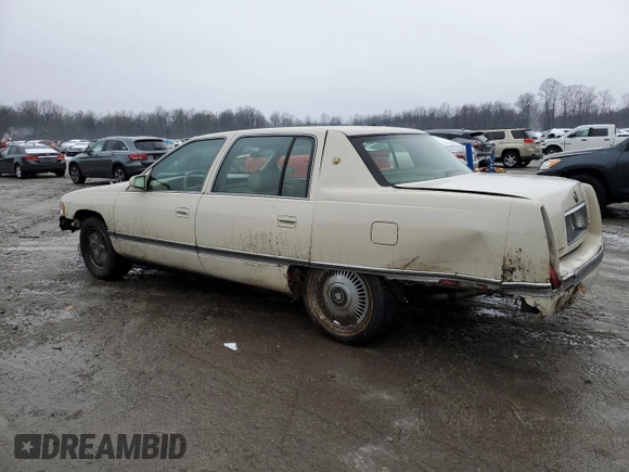 1995 Cadillac DeVille z VIN 1G6KD52B8SU274053, wystawiony jako Copart lot #86429934 z przebiegiem 100 496 mil mil oraz Szkoda całkowita • Salvage title. Historia ofert i sprzedaży dostępna na DreamBid. Obrazek 2.