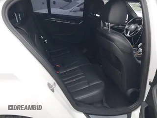 2018 BMW 5 Series 530e with VIN WBAJA9C56JB252738, listed as a IAAI auction lot 42260352 with 113,581 mi miles and . Bid and sale history available at DreamBid. Image 8.