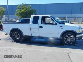 1997 Ford F-150 with VIN 1FTDX1723VKB04987, listed as a IAAI auction lot 41411405 with 234,750 mi miles and . Bid and sale history available at DreamBid. Image 13.
