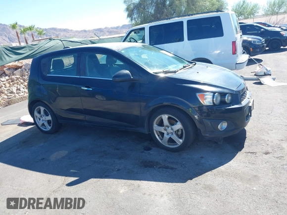 2015 Chevrolet Sonic LTZ with VIN 1G1JE6SB8F4116693, listed as a IAAI auction lot 42865997 with 102,961 mi miles and . Bid and sale history available at DreamBid. Image 12.