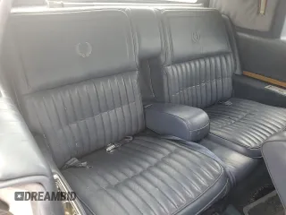 1984 Cadillac Eldorado z VIN 1G6AL5783EE654296, wystawiony jako Copart lot #74945374 z przebiegiem 37 040 mil mil oraz Szkody całkowita. Historia ofert i sprzedaży dostępna na DreamBid. Obrazek 10.
