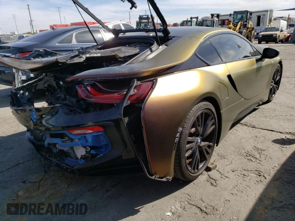 2016 BMW i8 z VIN WBY2Z2C51GV674865, wystawiony jako Copart lot #40417413 z przebiegiem 59 325 mil mil oraz . Historia ofert i sprzedaży dostępna na DreamBid. Obrazek 3.