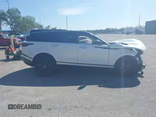 2025 Land Rover Range Rover Velar Dynamic SE with VIN SALYL2EX9SA802869, listed as a IAAI auction lot 41793091 with 5,614 mi miles and . Bid and sale history available at DreamBid. Image 14.