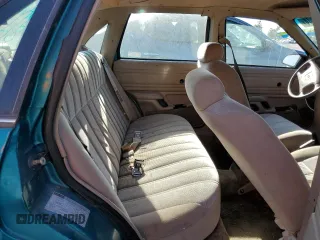 1993 Ford Tempo GL z VIN 2FAPP36X2PB168916, wystawiony jako Copart lot #63911044 z przebiegiem 30 114 mil mil oraz Tytuł czysty. Historia ofert i sprzedaży dostępna na DreamBid. Obrazek 10.