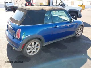 2007 MINI Convertible with VIN WMWRF33507TG16644, listed as a IAAI auction lot 40058098 with 163,215 mi miles and . Bid and sale history available at DreamBid. Image 4.