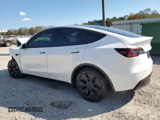 2025 Tesla Model Y Long Range with VIN 7SAYGDED3SA339079, listed as a Copart auction lot 82041424 with 1,793 mi miles and Salvage Title. Bid and sale history available at DreamBid. Image 2.