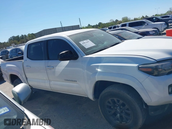2021 Toyota Tacoma SR with VIN 3TYAX5GN6MT016452, listed as a IAAI auction lot 41816457 with 30,617 mi miles and . Bid and sale history available at DreamBid. Image 13.